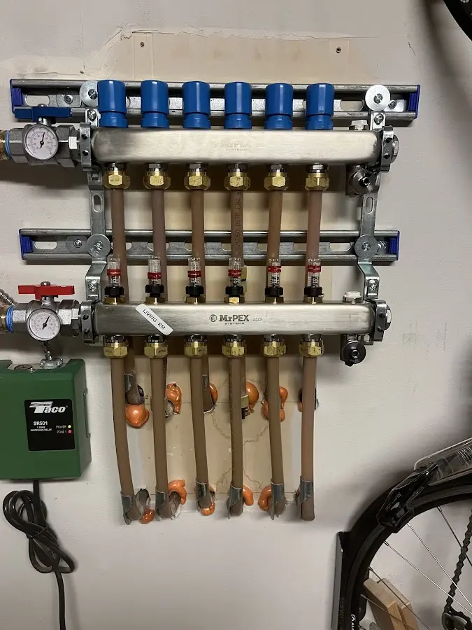 Plumber performing Gas Leak Detection at a residential property in Cheshire